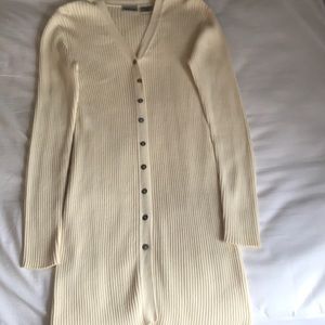 Button down sweater falls above the knee